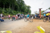 Kids cutting the ribbon for the opening of the pump track//TJ Kearns Photo